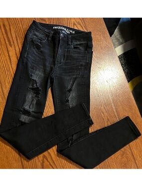 American Eagle • Women’s Size 00 • Black Distressed Super Super Stretch Jeans